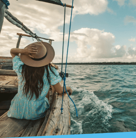 Woman on boat on lake